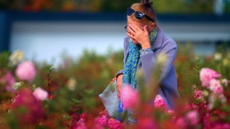 Image-Of-Caucasian-Old-Woman-With-Bag-Walking-Around-Garden-Park