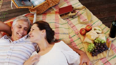 happy couple relaxing under shed 4k