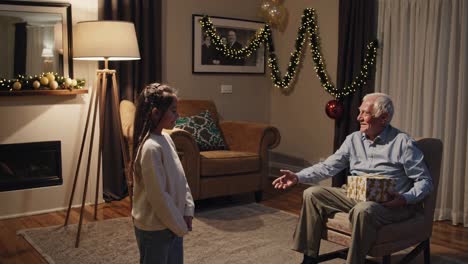 grandparent and grandchild exchange christmas gifts