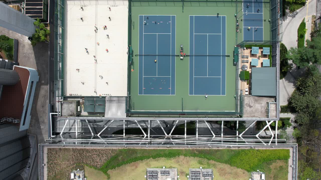 Top view of tennis court in mid town