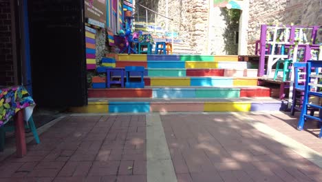 colorful stairs and street cafe