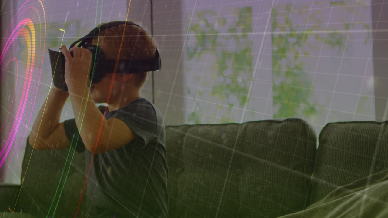 집에서 vr 헤드 ⁇ 을 착용하는 백인 소년에 대한 범위 스캐닝에 대한 빛의 흔적