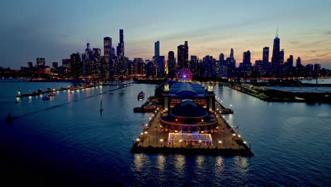 drone orbiting the navy pier auditorium, colorful morning in downtown chicago
