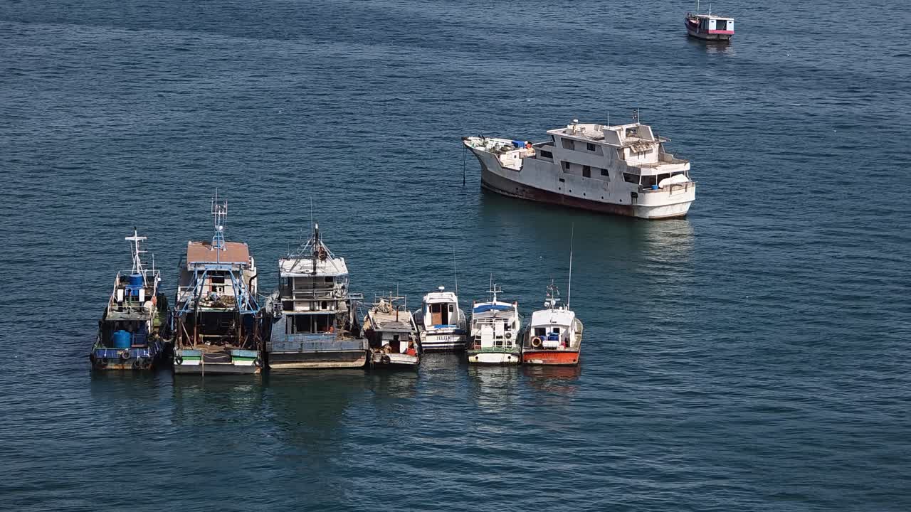Fishing Boat Trawlers Anchored In The Sea In Kota Kinabalu, Malaysia - Static Shot