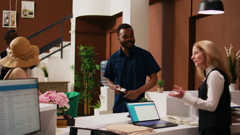 diverse couple checking in at hotel