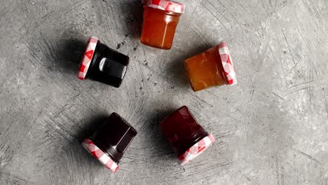 small jars with various marmalade