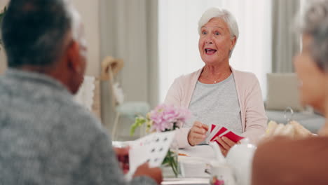 High-five,-poker-and-senior-friends-at-a-tea-party