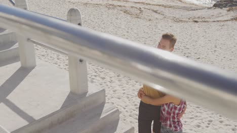 young adult couple relaxing at the seaside