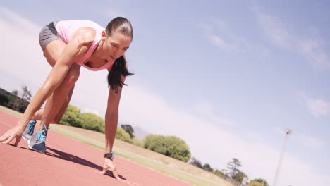 focused sportswoman running