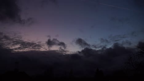 cumulonimbus cloud moving at sunset sky time lapse silhouette clock tower