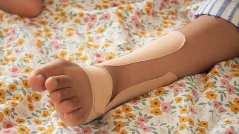 close up of a taped ankle