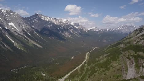 a rocky mountain valley in spring