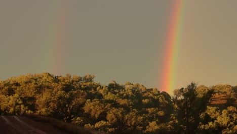 double rainbow over australian bush