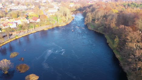 Aerial-view-of-river-flowing-through-town