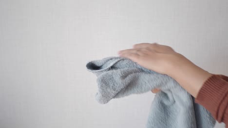 drying hands with a towel