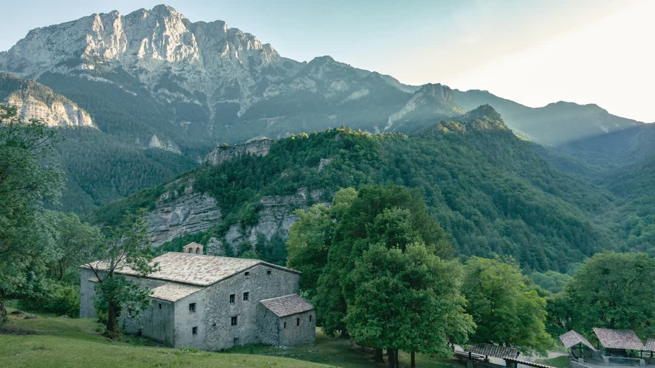 Serene Mountain Landscape with Stone Chapel