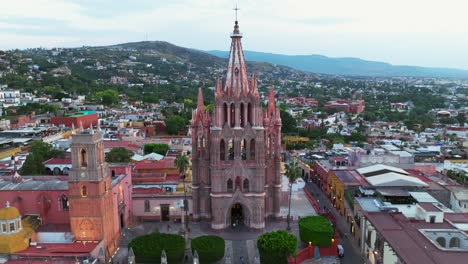 Daytime-Aerial-Dolly-Out-Panoramic-View-Over-Parroquia-De-San-Miguel-Arcangel-And-El-Campanario-In-San-Miguel-De-Allende