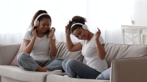 sisters enjoying music together