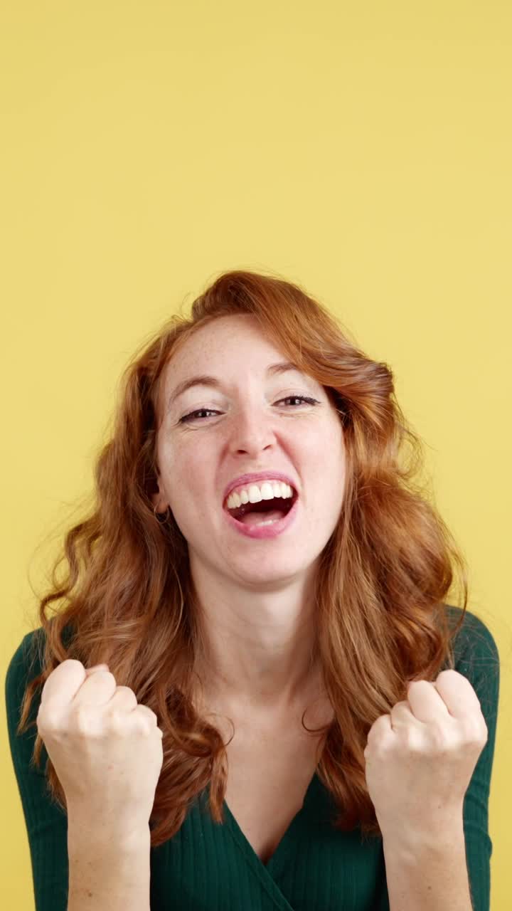Expressive Redhead Woman Displaying Various Emotions