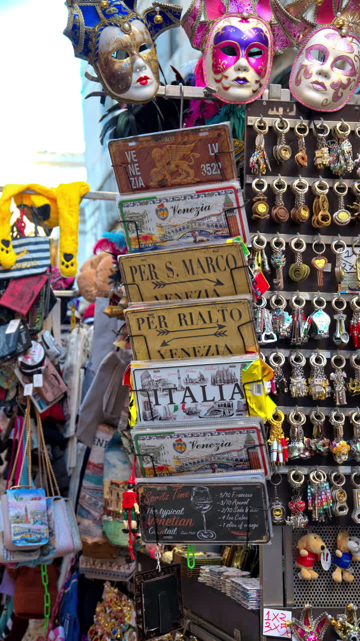 Different souvenirs at a store on the street in the city. Vertical in Venice