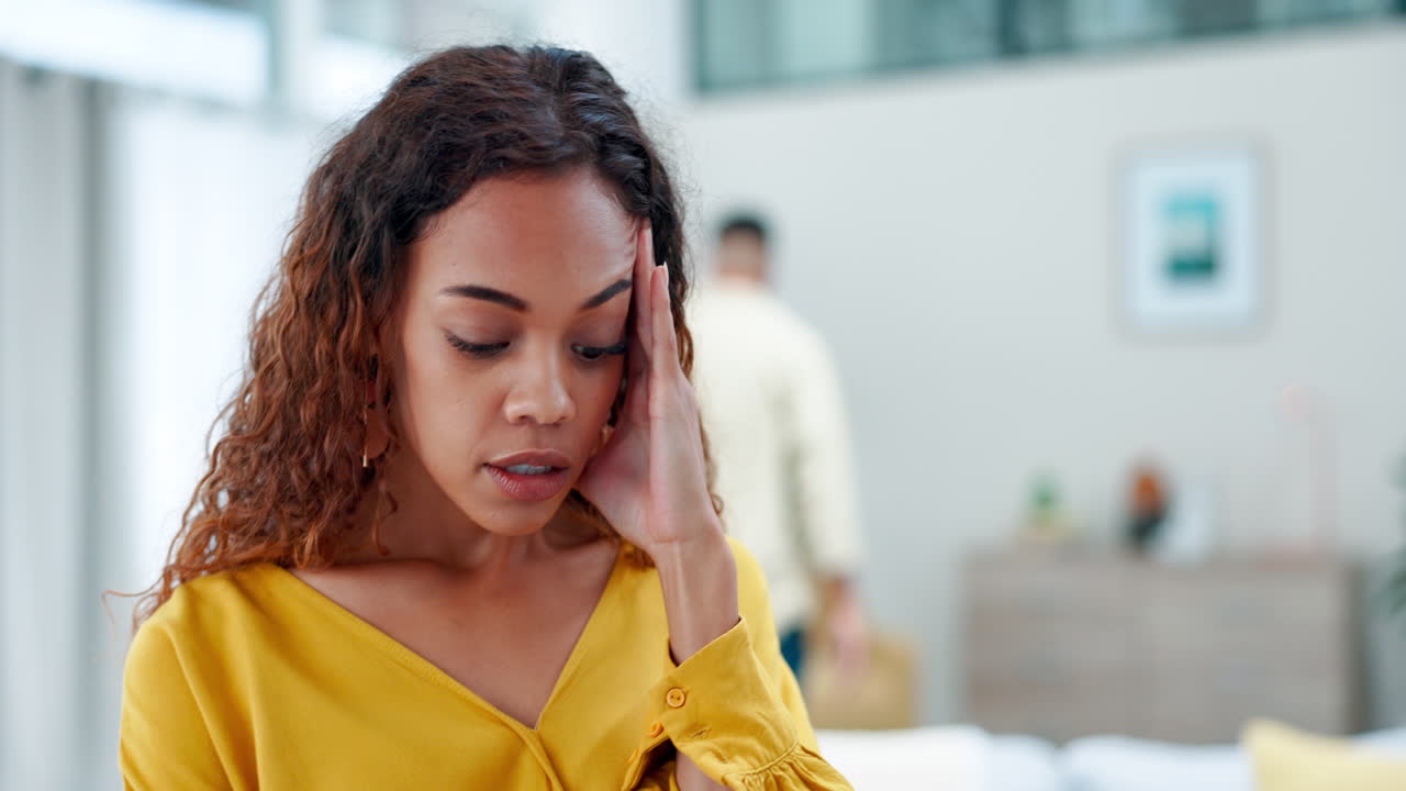 Stress, argument and couple in living room
