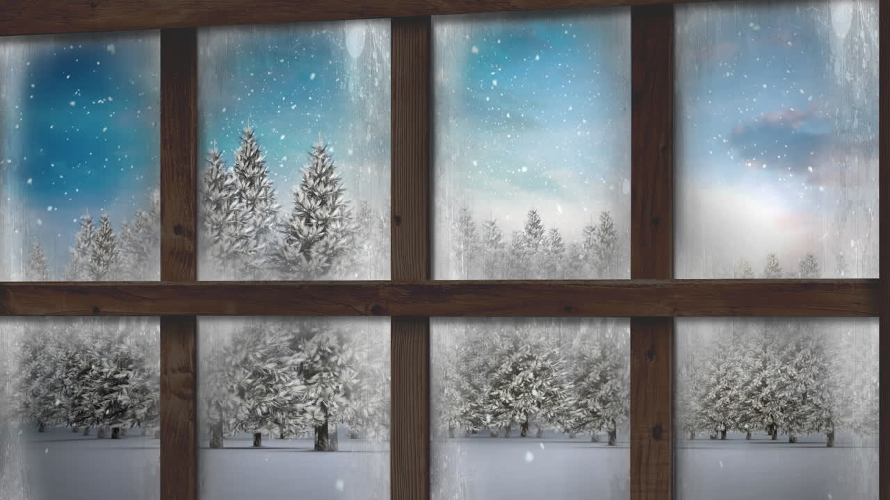 Wooden window frame against snow falling over multiple trees on winter landscape