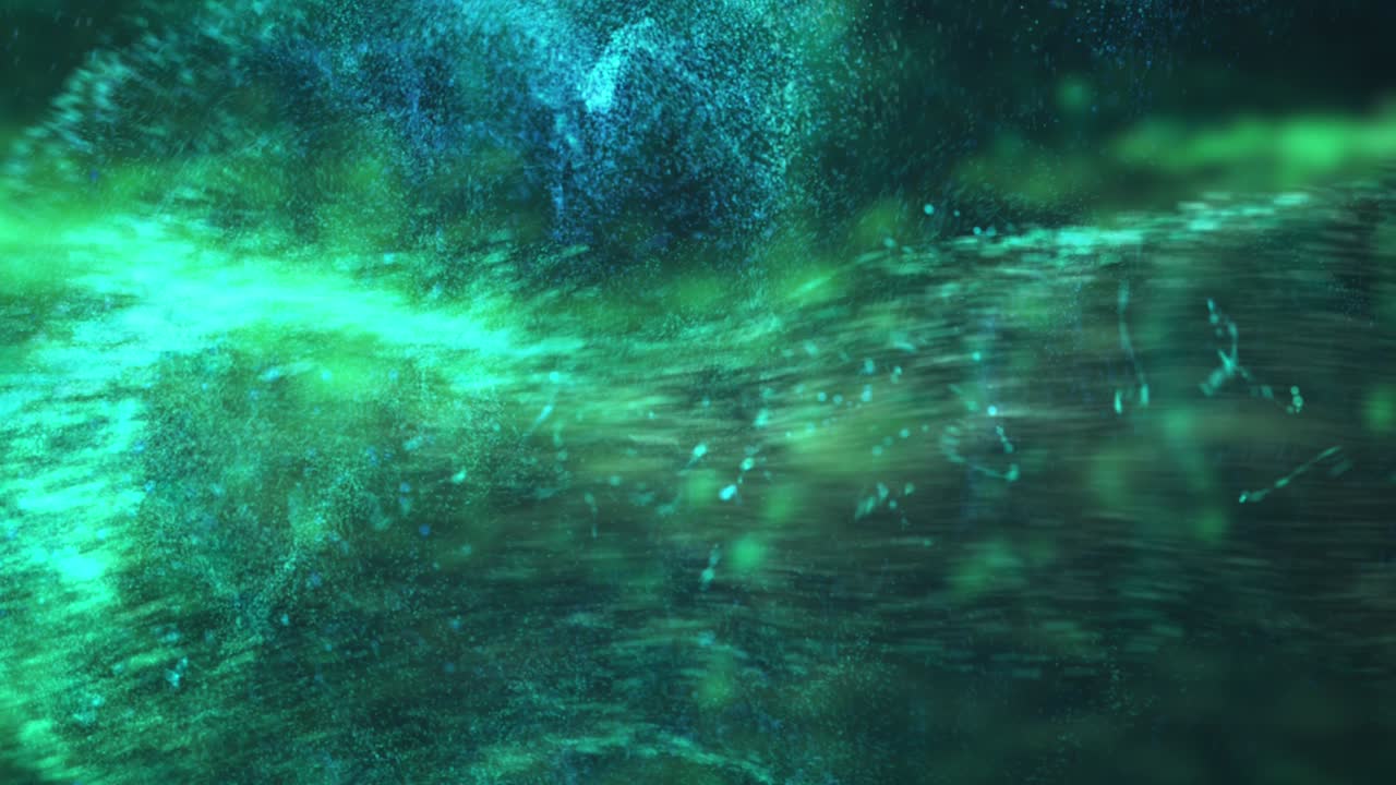 검은색 배경에 녹색 먼지가 어지고 있습니다.