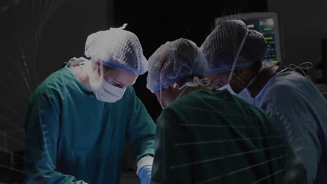 surgeons performing medical procedure in operating room, focusing on precision work