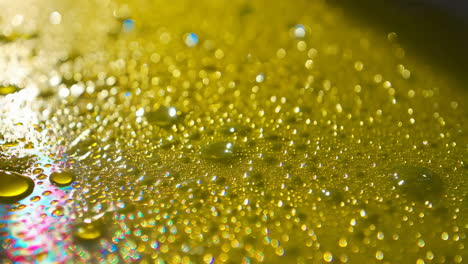 water drops on a yellow surface