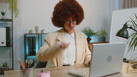 upset businesswoman showing thumbs down dislike bad work disapproval dissatisfied feedback at office