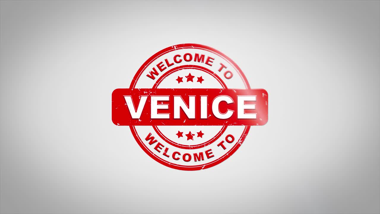 bienvenido a venecia firmado texto de estampado animación de sello de madera. tinta roja en papel blanco limpio fondo de superficie con fondo matte verde incluido.