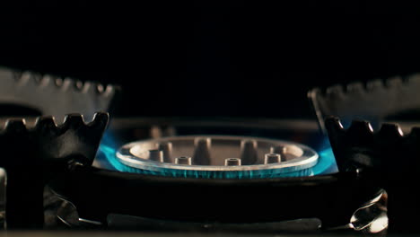 close-up of a lit gas stove burner