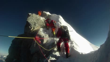 climber takes first steps up hilary step