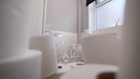 Toilet-paper-falling-through-the-air-in-a-bathroom