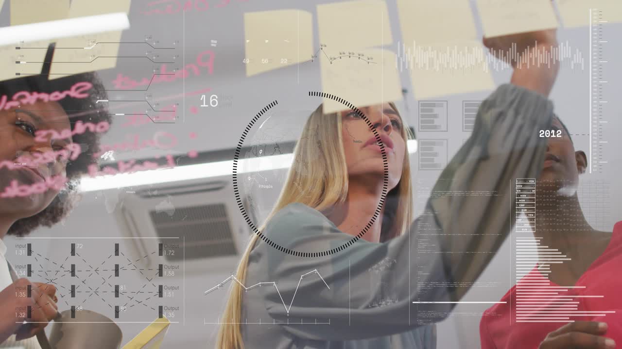 Center woman planning, reaching with red marker, writing on glass while tech overlaying charts