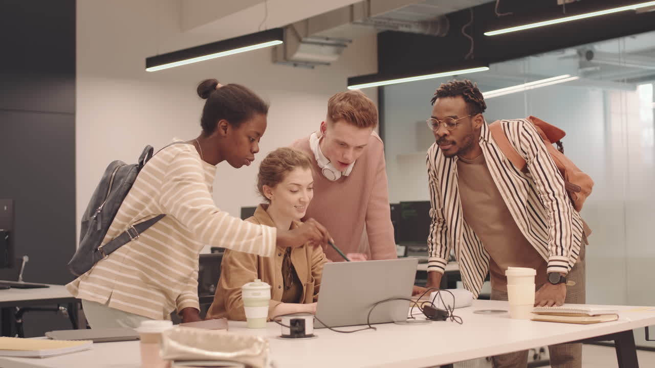 Programmers Working on Laptop Together