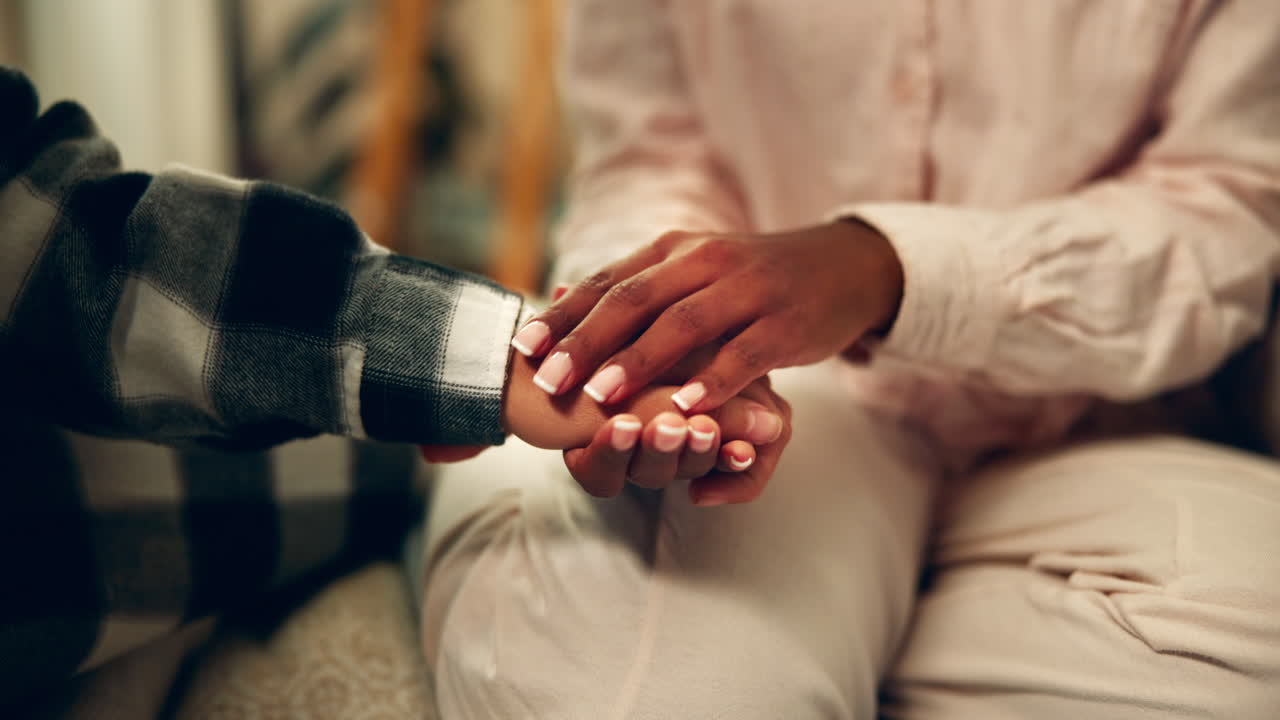 Hands offering support and care