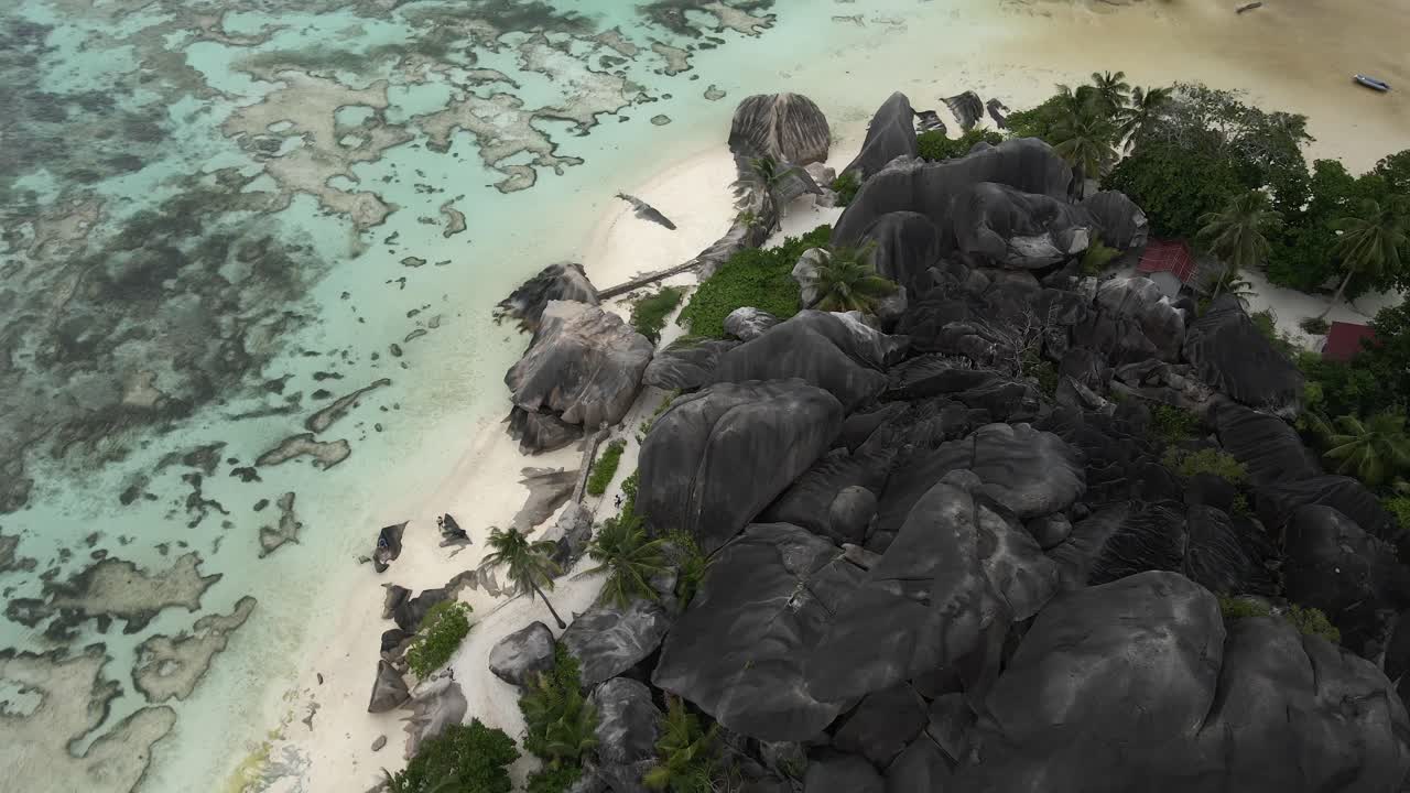 Anse Source d'Argent beach on island La Digue in Seychelles filmed from above