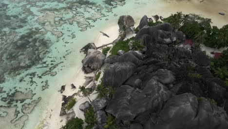 anse source d'argent beach on island la digue in seychelles filmed from above