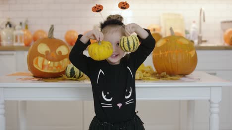 girl with pumpkins