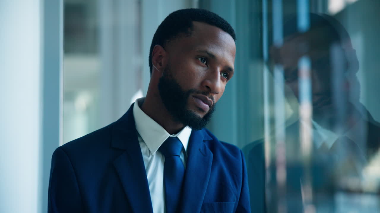 Thoughtful businessman in formal wear