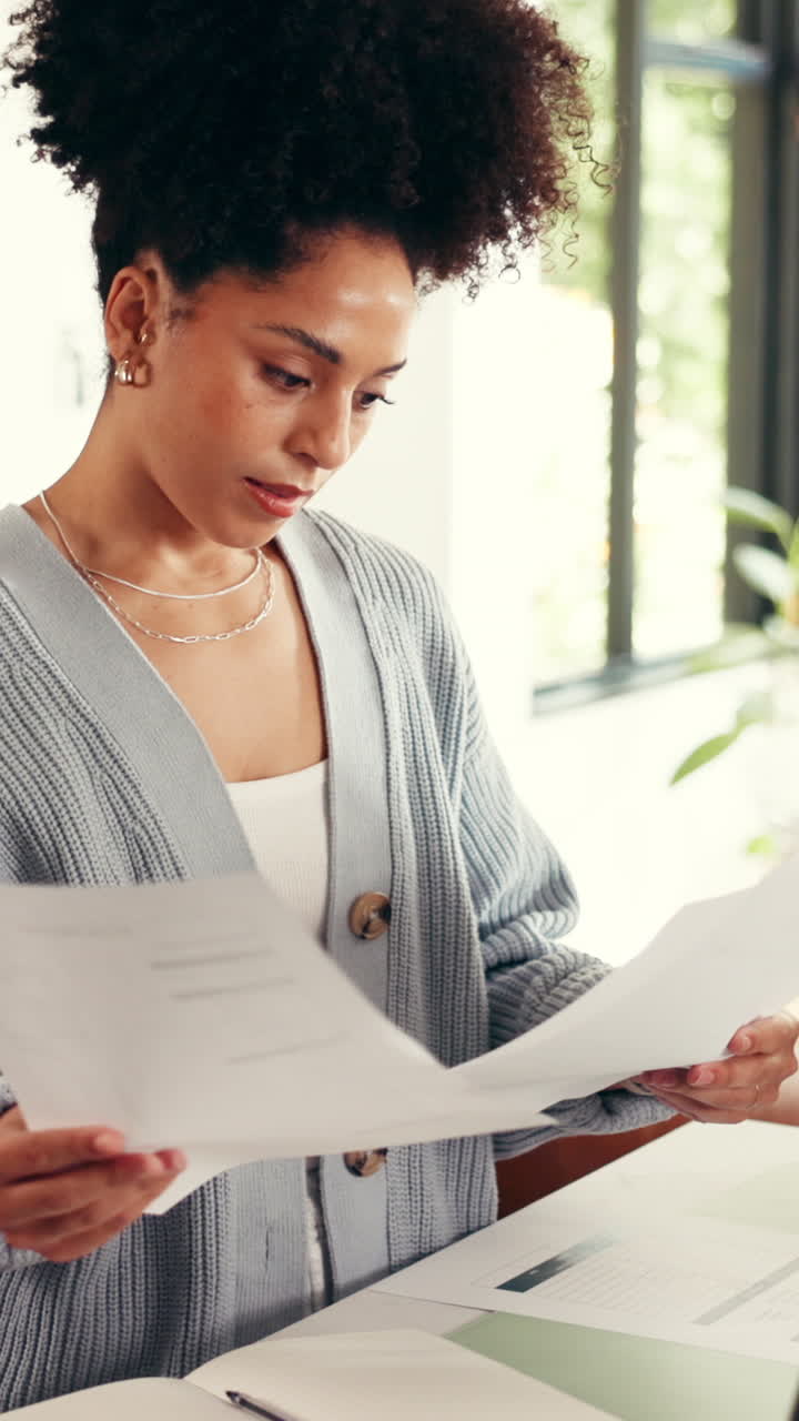 Woman Working on Documents in Home Office
