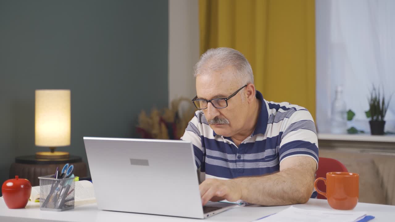 Home office worker old man freelancing.
