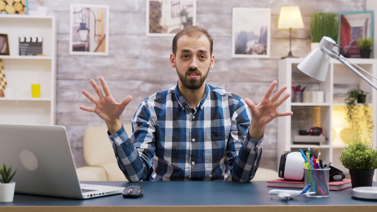 Man having a video call at his desk