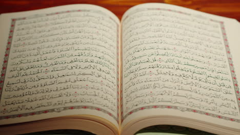 quran book close-up, praying, islamic religion. religious holiday ramadan, holy month. worship, making traditional prayer to god