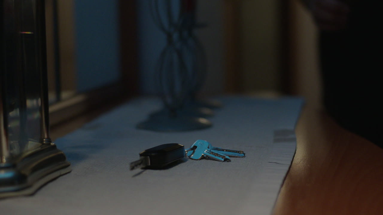 Keys and Decor on a Table at Night