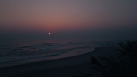 a dark beach at sunset in vietnam