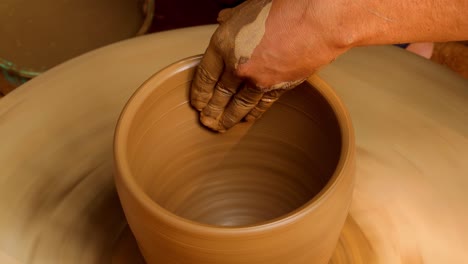 potter at work makes ceramic dishes. india, rajasthan.