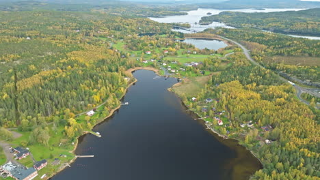 vista of swedish countryside with autumn forests and calm lakes in sweden, europe