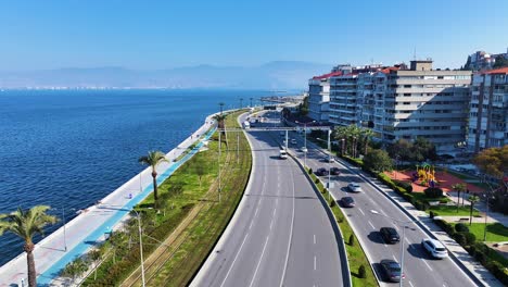 vehicles driving on the street, drone footage of cars in traffic